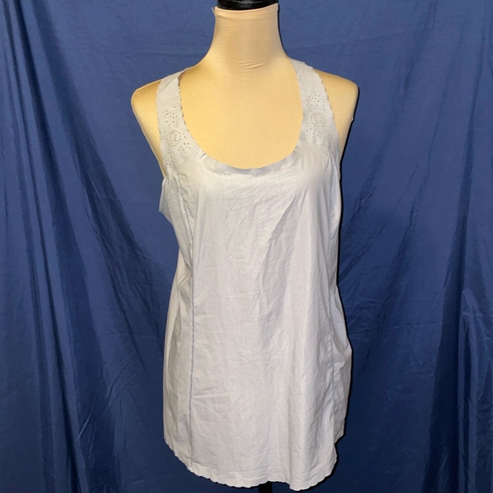 Lululemon top Medium blue pinstripe with Lazer cut detail.